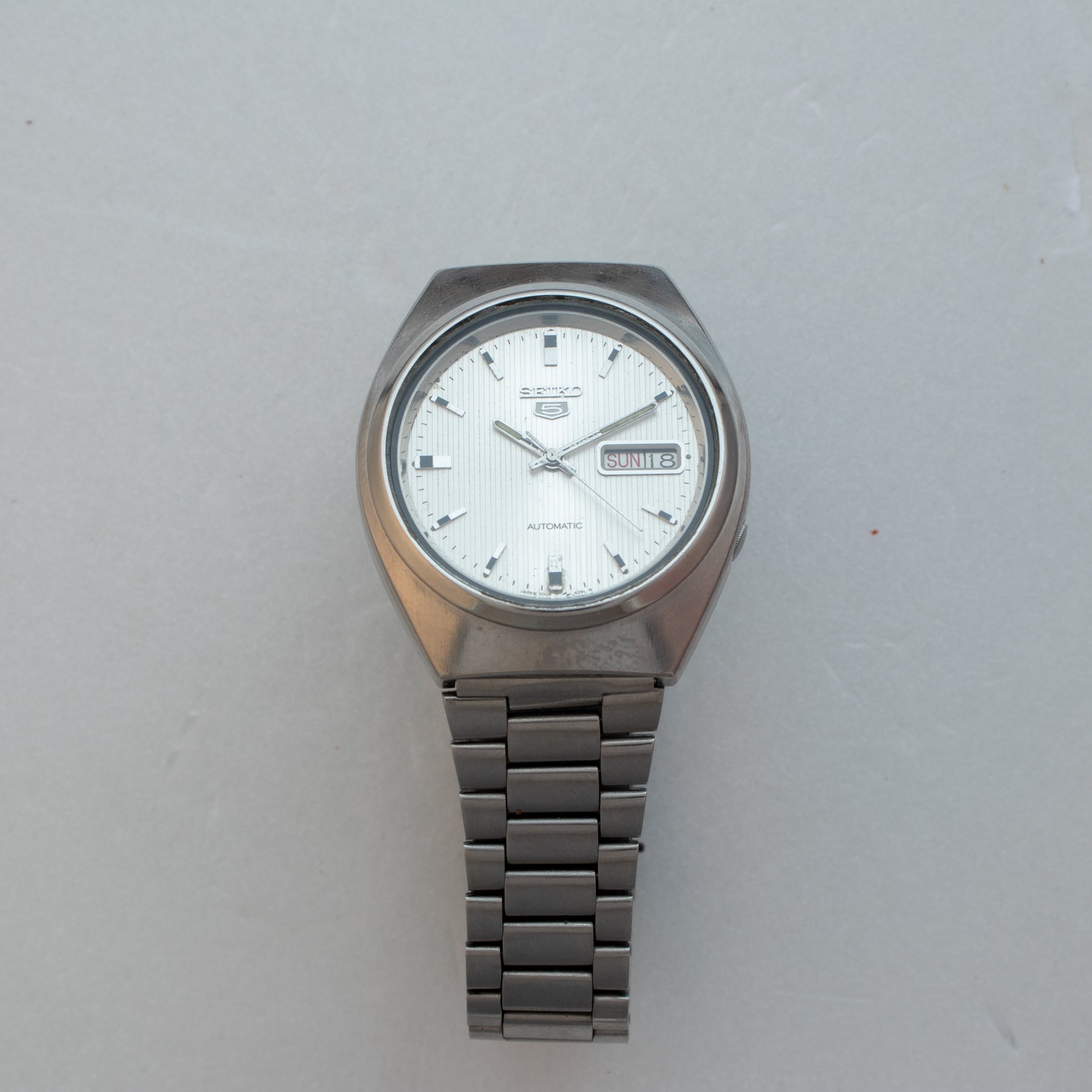 Additional front view of Vintage Seiko 5 7009-8760 Automatic Silver Pinstripe Dial Watch