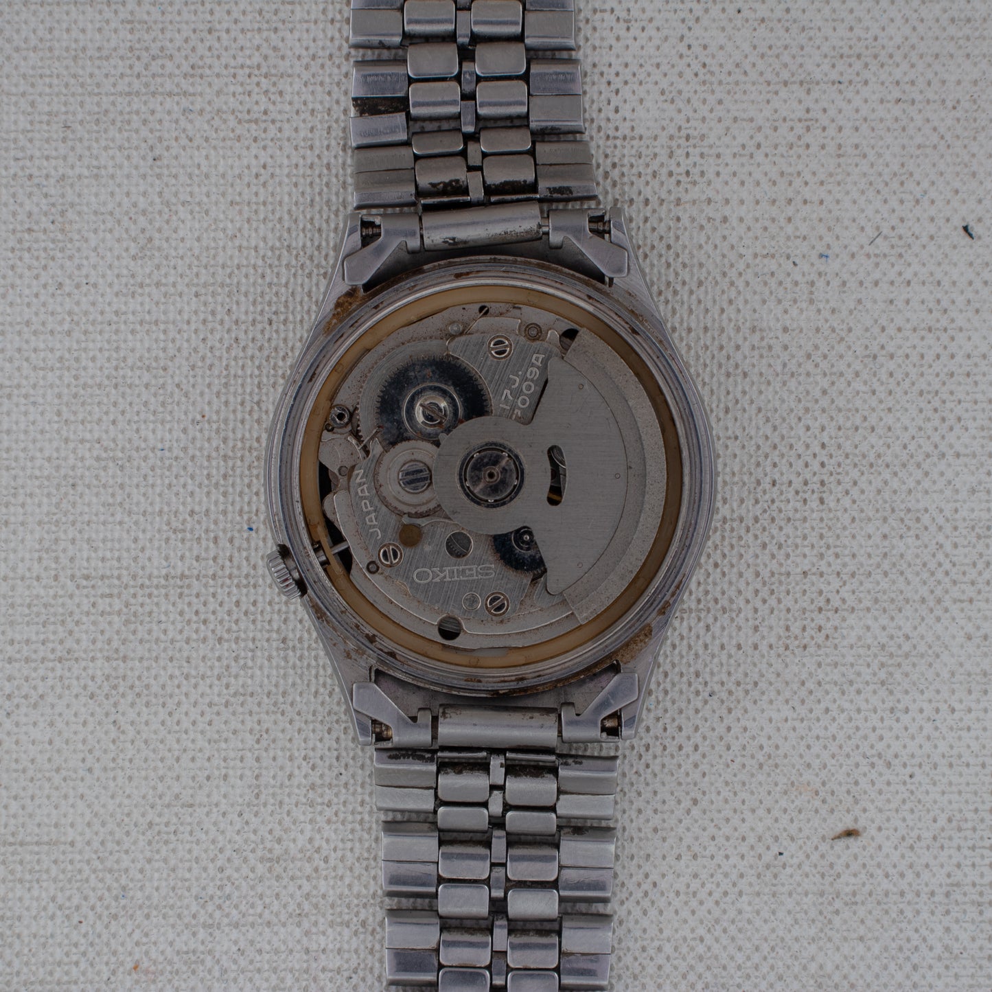 Vintage Seiko 5 Auto 7009-3100 Black Dial Gold Accents Arabic/English Day Watch