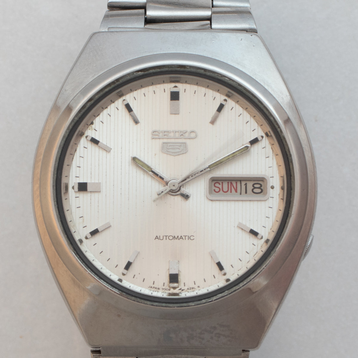 Vintage Seiko 5 7009-8760 wristwatch dial detail