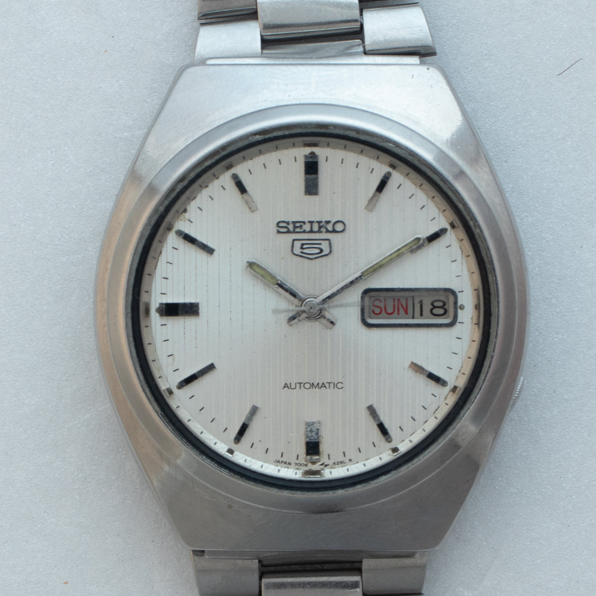Vintage Seiko 5 7009-8760 wristwatch dial detail