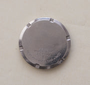 Caseback of Vintage Seiko 5 7009-8760 Automatic Silver Pinstripe Dial Watch showing reference details