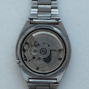 Automatic movement of Vintage Seiko 5 7009-8760 Automatic Silver Pinstripe Dial Watch