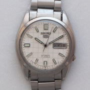 Dial close-up of Vintage Seiko 5 7009-876J Automatic White Checkerboard Dial Watch