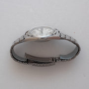 Crown-side view of Vintage Seiko 5 7009-876J Automatic White Checkerboard Dial Watch