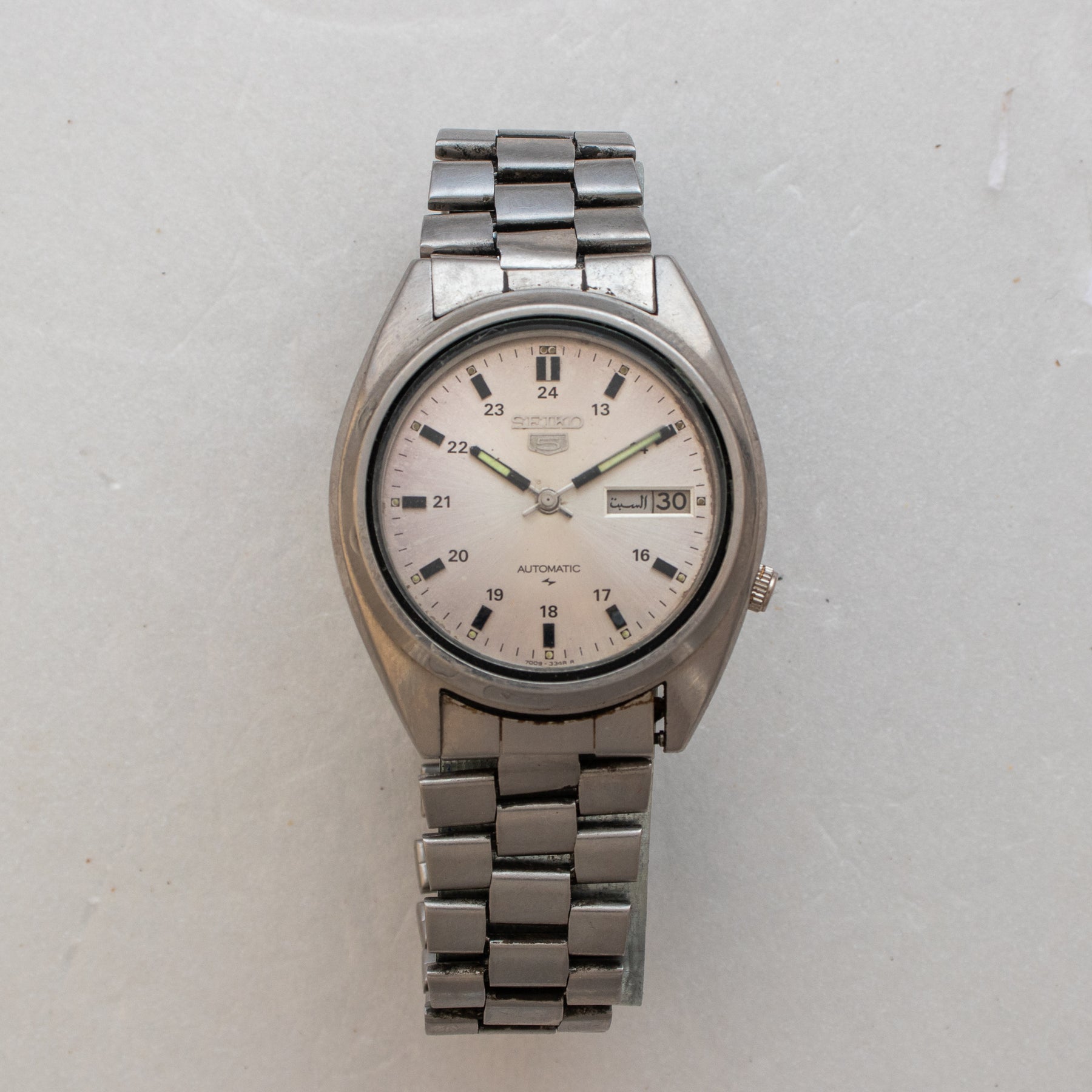 Front view of Vintage Seiko 5 7009-4040 Automatic Silver 24-Hour Dial Watch