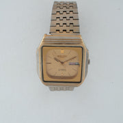 Vintage Seiko 5 6349-5000 Automatic 23J Gold Dial Day Date Wristwatch