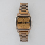 Vintage Seiko 5 7009-5862 Automatic 17J Gold Dial Day Date Wristwatch