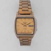 Vintage Seiko 5 7009-5862 Automatic 17J Gold Dial Day Date Wristwatch