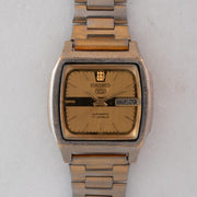 Vintage Seiko 5 7009-5862 Automatic 17J Gold Dial Day Date Wristwatch