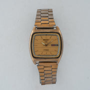Vintage Seiko 5 7009-2031 Automatic 17J Gold Dial Day Date Wristwatch