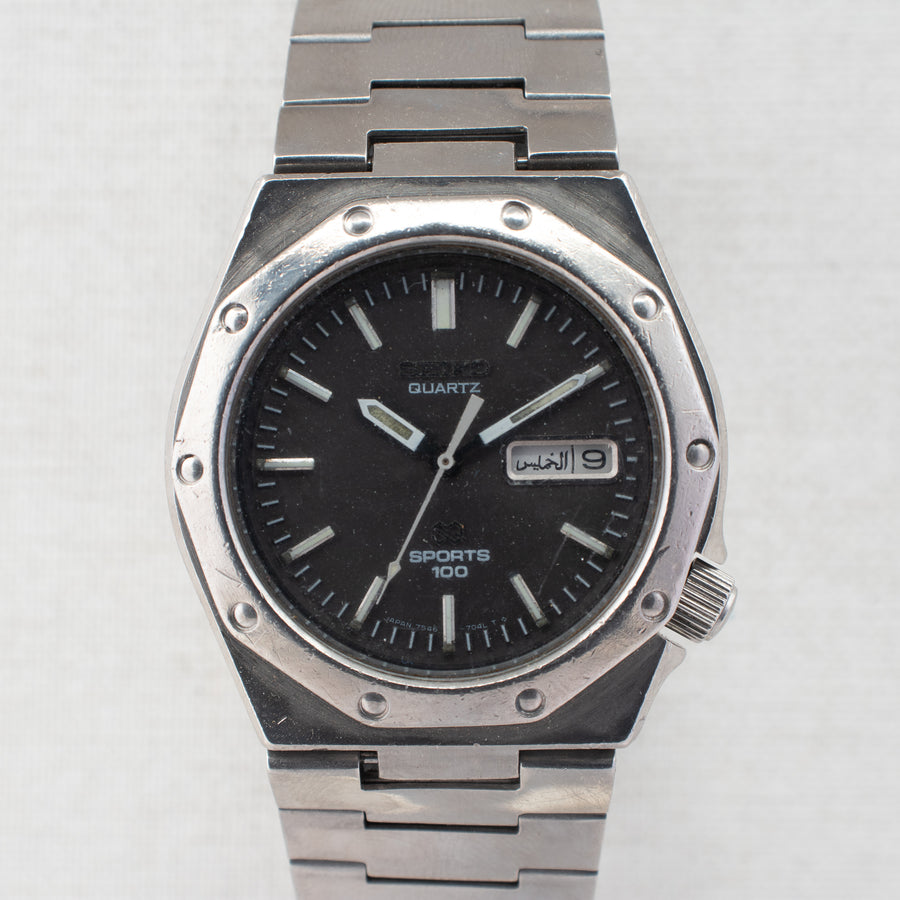 Vintage Seiko Sports 100 7546-703A Quartz Black Dial Day Date Wristwatch