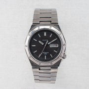 Vintage Seiko Sports 100 7546-703A Quartz Black Dial Day Date Wristwatch