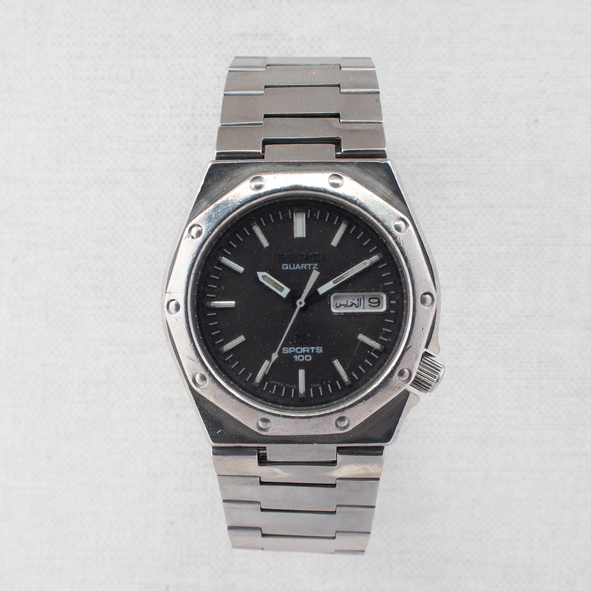 Vintage Seiko Sports 100 7546-703A Quartz Black Dial Day Date Wristwatch