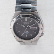 Vintage Seiko Sports 100 7546-703A Quartz Black Dial Day Date Wristwatch
