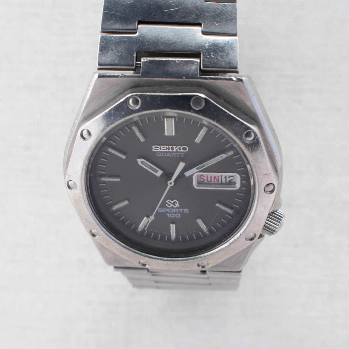 Vintage Seiko Sports 100 7546-703A Quartz Black Dial Day Date Wristwatch