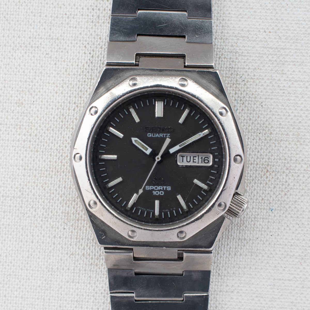 Vintage Seiko Sports 100 7546-703A Quartz Black Dial Day Date Wristwatch