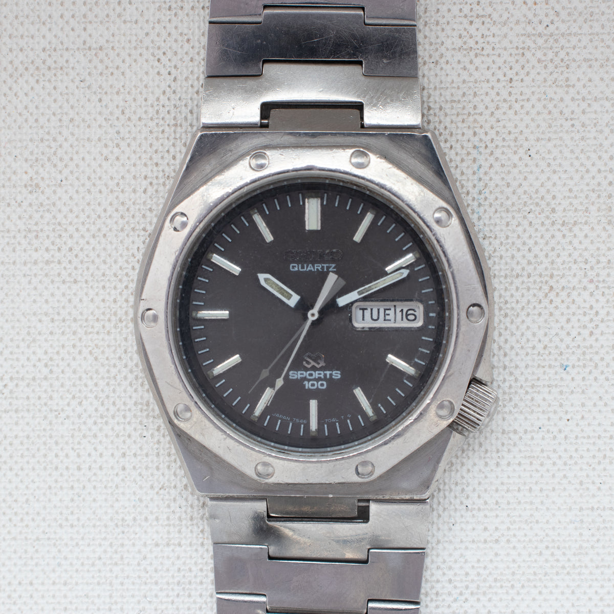 Vintage Seiko Sports 100 7546-703A Quartz Black Dial Day Date Wristwatch