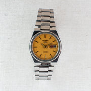 Vintage Seiko 5 7009-3131 Automatic 17J Gold Dial Day Date Wristwatch