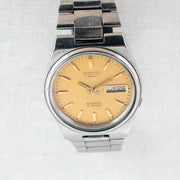 Vintage Seiko 5 7009-3131 Automatic 17J Gold Dial Day Date Wristwatch