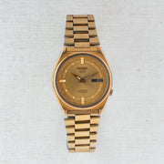 Vintage Seiko 5 7019-8180 Automatic 21J Gold Dial Day Date Wristwatch