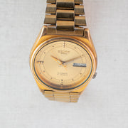 Vintage Seiko 5 7019-8180 Automatic 21J Gold Dial Day Date Wristwatch