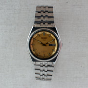 Vintage Seiko 5 7009-206K Automatic 17J Gold Dial Day Date Wristwatch