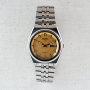 Vintage Seiko 5 7009-206K Automatic 17J Gold Dial Day Date Wristwatch