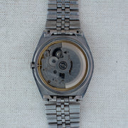 Vintage Seiko 5 7009-206K Automatic 17J Gold Dial Day Date Wristwatch
