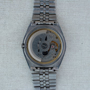 Vintage Seiko 5 7009-206K Automatic 17J Gold Dial Day Date Wristwatch