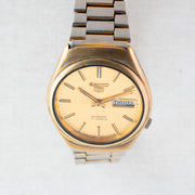 Vintage Seiko 5 6309-7330 Automatic 17J Gold Dial Day Date Wristwatch