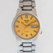 Vintage Seiko 5 7S26-02P0 Automatic 21J Gold Dial Day Date Wristwatch