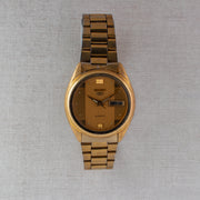 Vintage Seiko 5 7009-3100 Automatic 17J Gold Dial Day Date Wristwatch