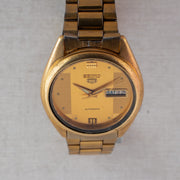 Vintage Seiko 5 7009-3100 Automatic 17J Gold Dial Day Date Wristwatch