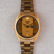 Vintage Seiko 5 7009-3100 Automatic 17J Gold Dial Day Date Wristwatch