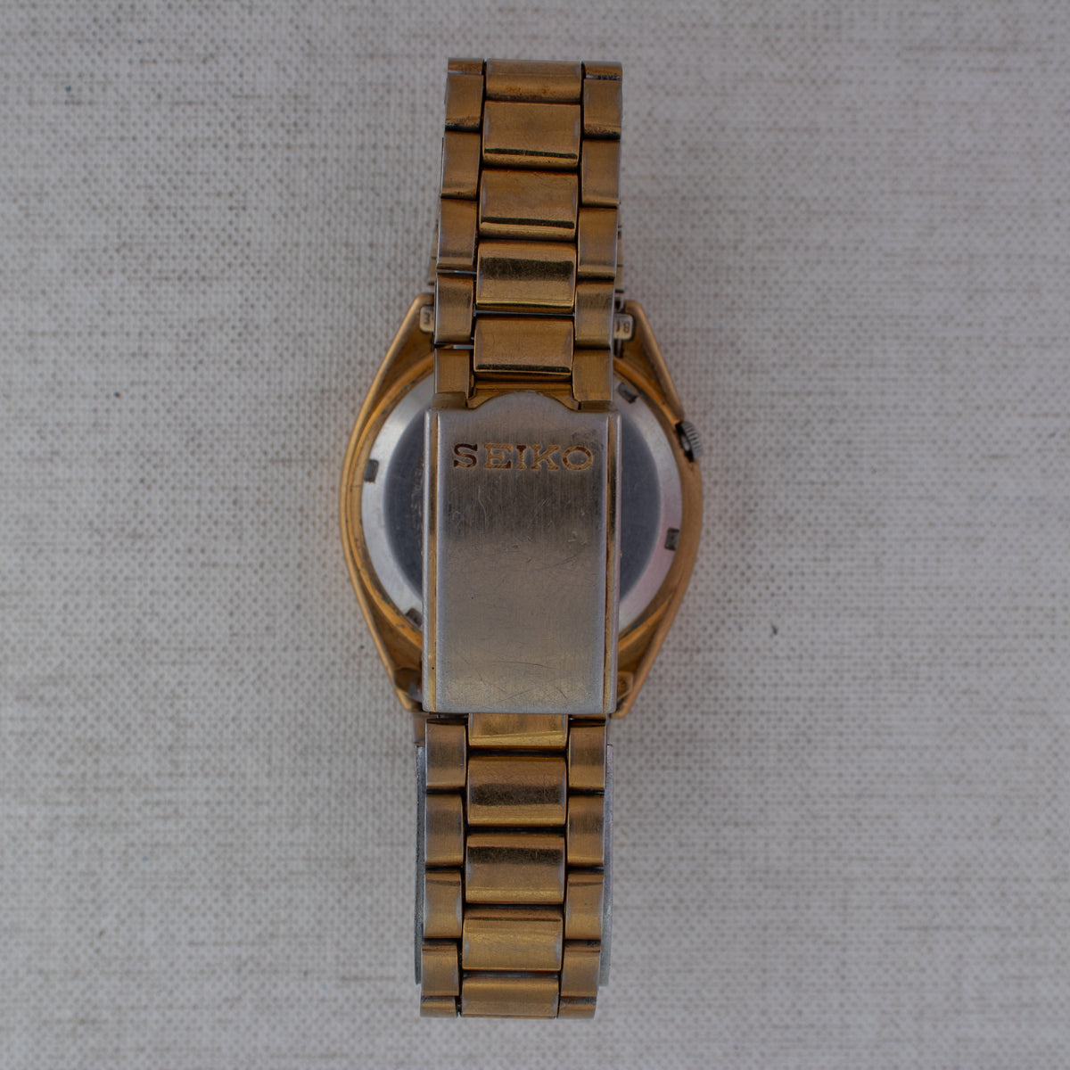 Vintage Seiko 5 7009-3100 Automatic 17J Gold Dial Day Date Wristwatch