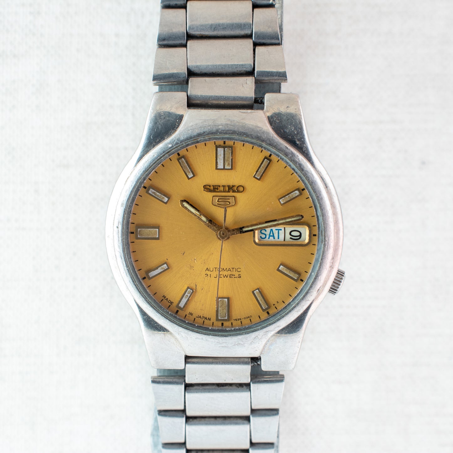 Seiko 5 Automatic Watch | Gold Dial 7S26-02P0 Exhibition Back Arabic English Day