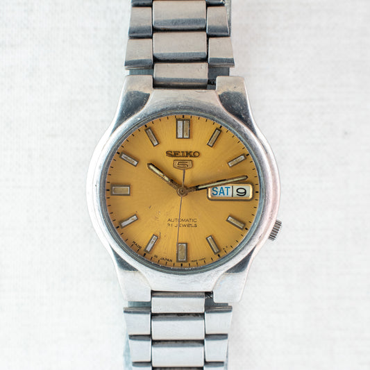 Seiko 5 Automatic Watch | Gold Dial 7S26-02P0 Exhibition Back Arabic English Day