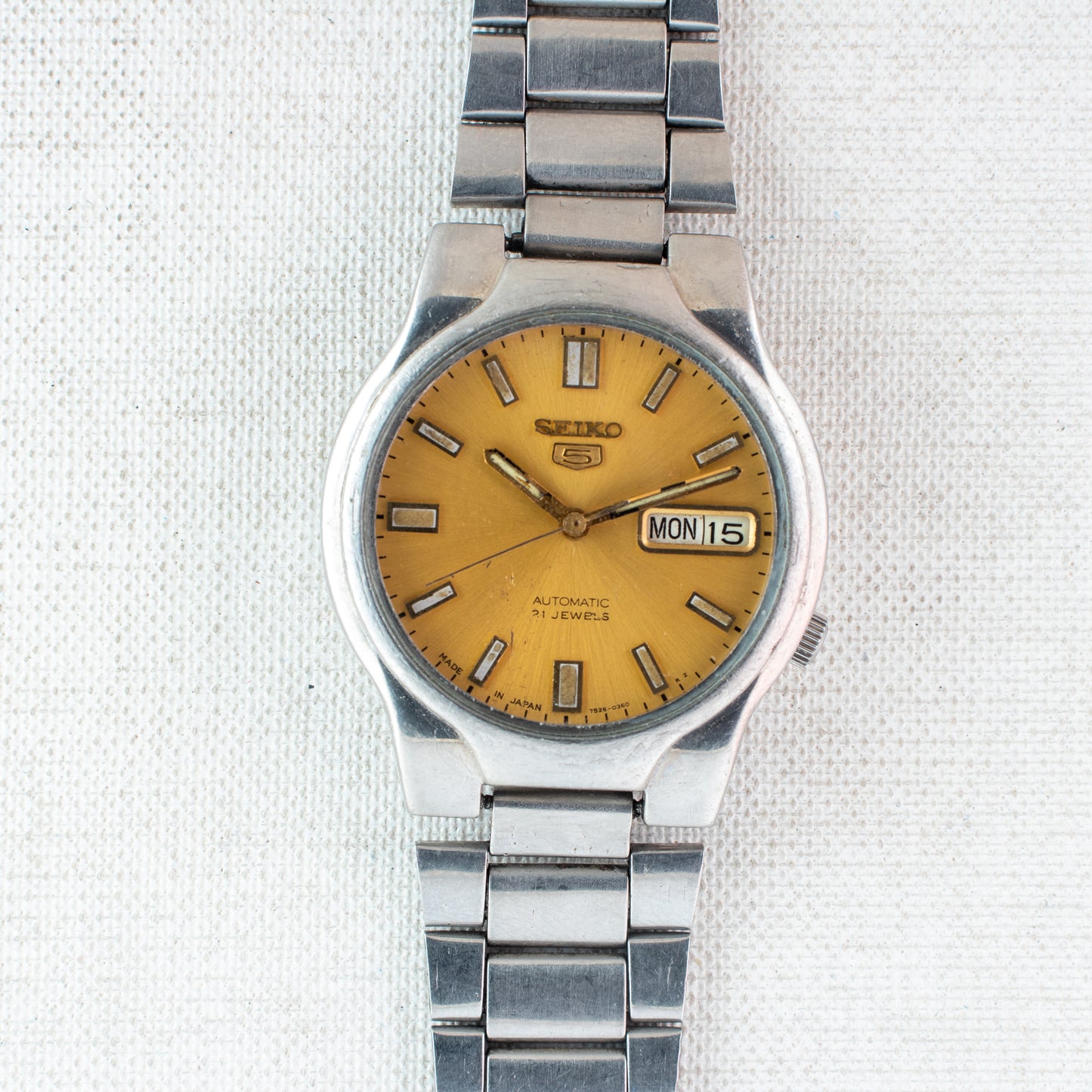Seiko 5 Automatic Watch | Gold Dial 7S26-02P0 Exhibition Back Arabic English Day