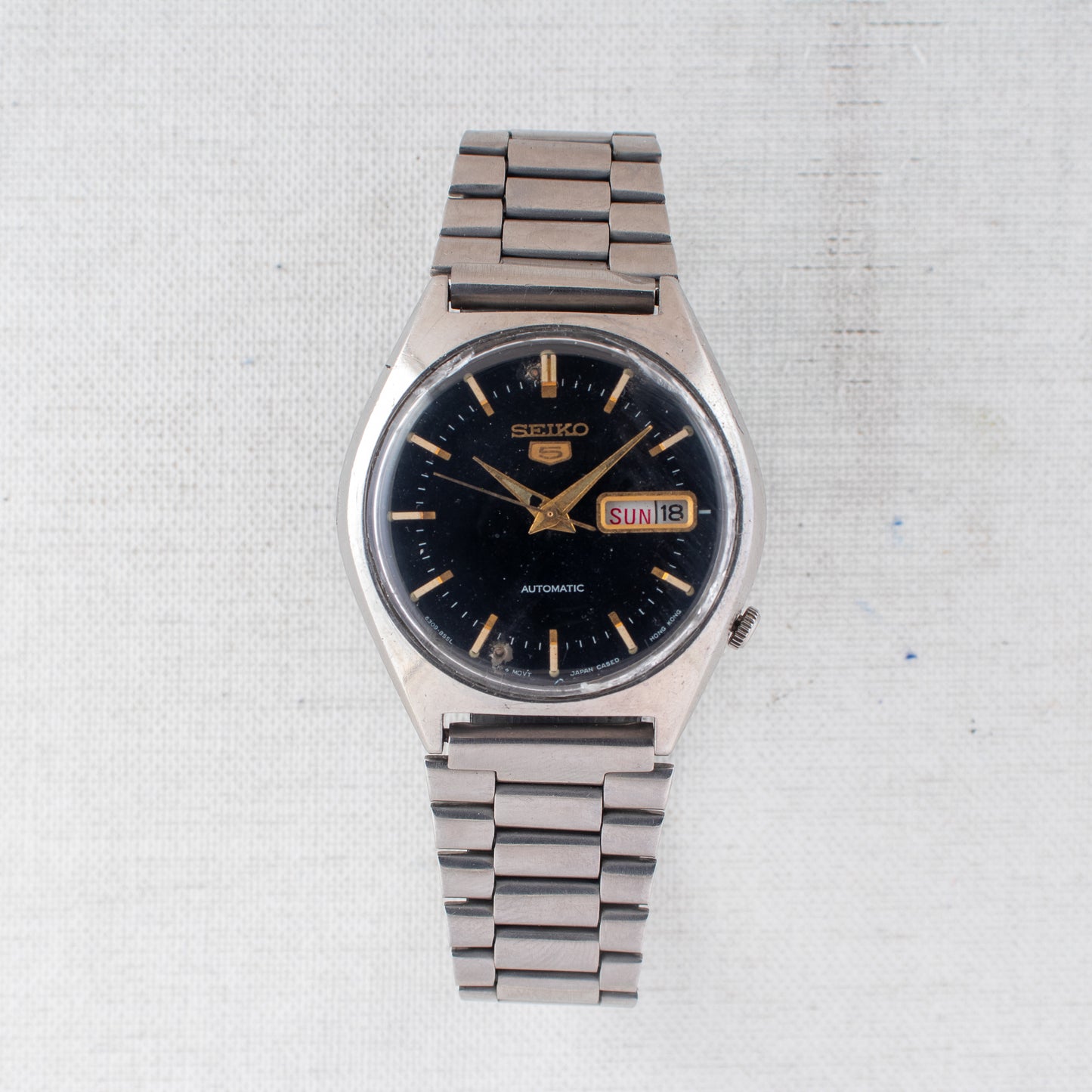 Vintage Seiko 5 Auto 6309-8670 Watch Black Dial Italian/English Day Gold Accents