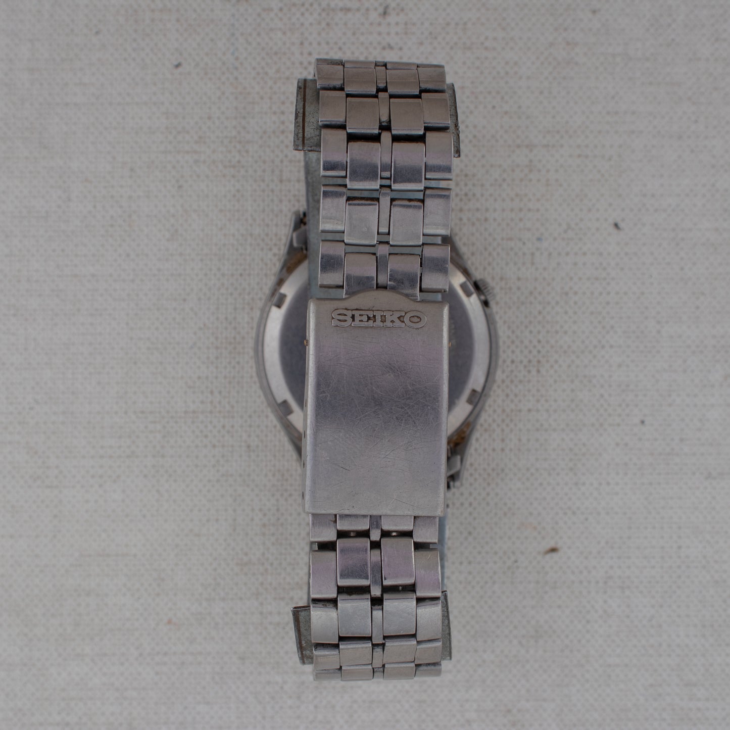 Vintage Seiko 5 Auto 7009-3100 Black Dial Gold Accents Arabic/English Day Watch