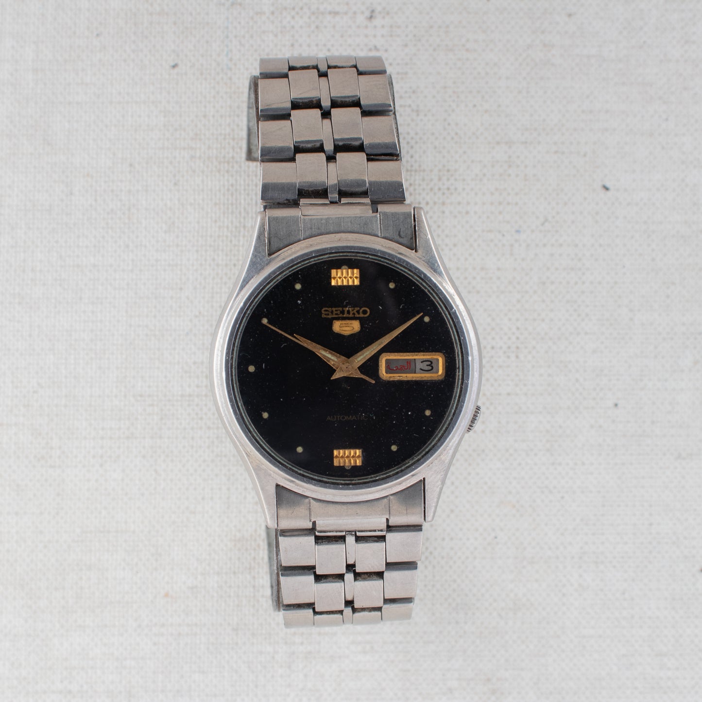 Vintage Seiko 5 Auto 7009-3100 Black Dial Gold Accents Arabic/English Day Watch