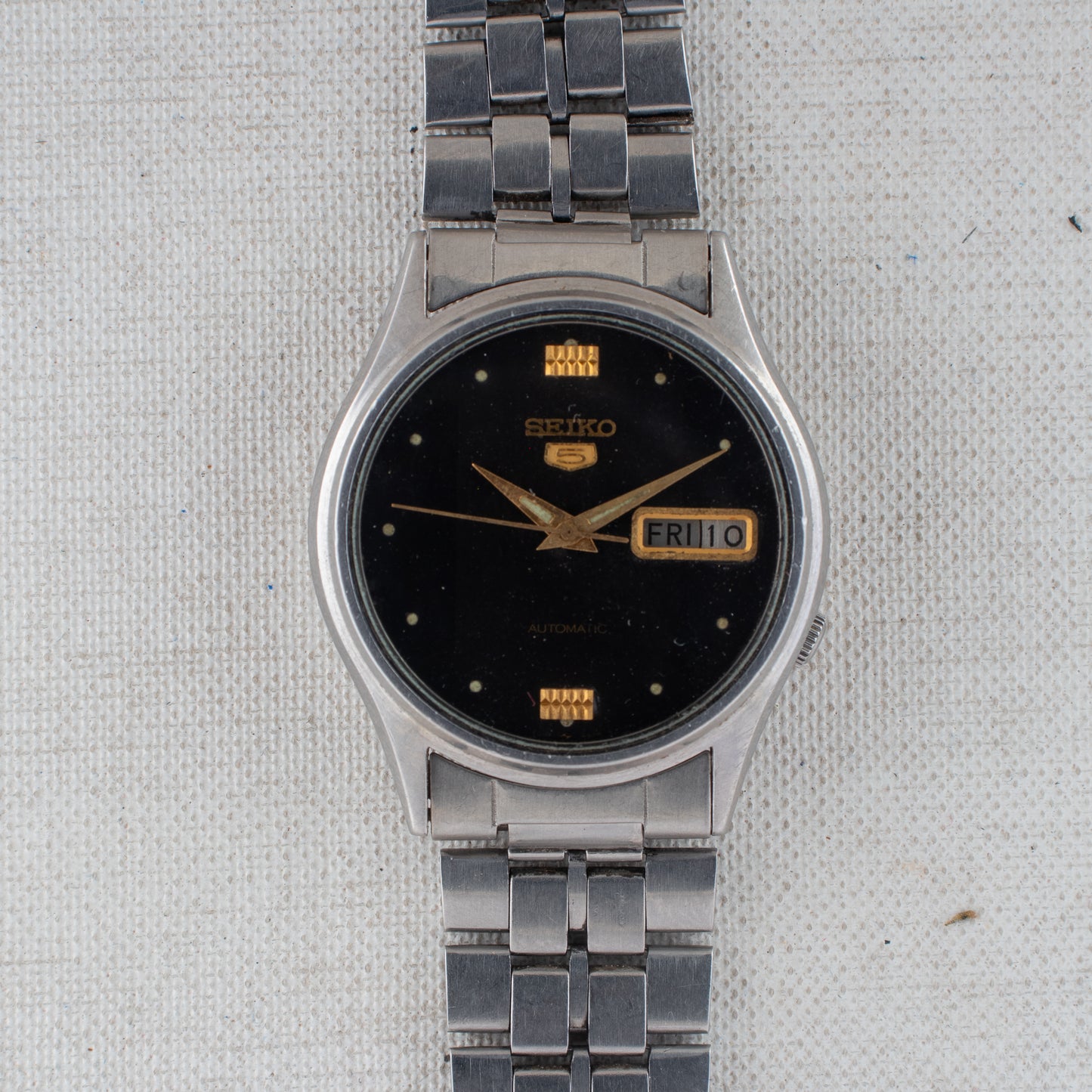 Vintage Seiko 5 Auto 7009-3100 Black Dial Gold Accents Arabic/English Day Watch