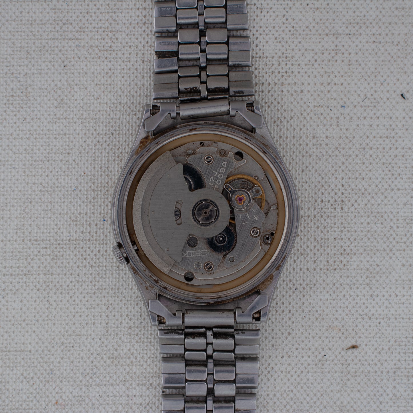 Vintage Seiko 5 Auto 7009-3100 Black Dial Gold Accents Arabic/English Day Watch