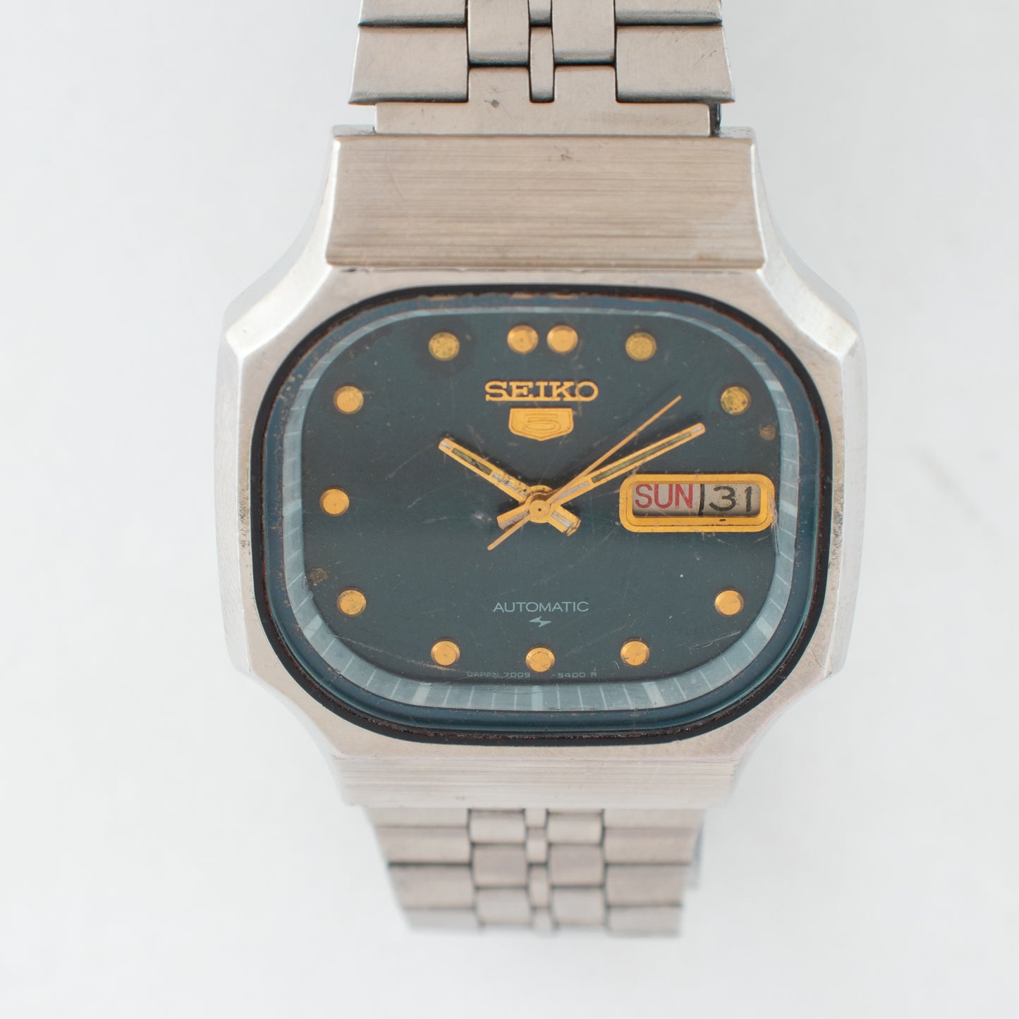 Vintage Seiko 5 Automatic 7009-529A Green Dial TV Case Arabic/English Day Watch