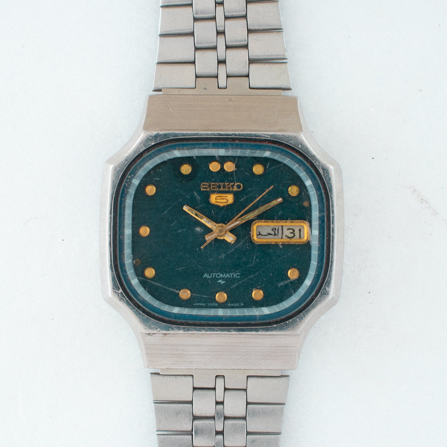 Vintage Seiko 5 Automatic 7009-529A Green Dial TV Case Arabic/English Day Watch