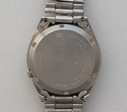 Caseback of vintage Seiko 5 7019-6081 watch showing serial 184237