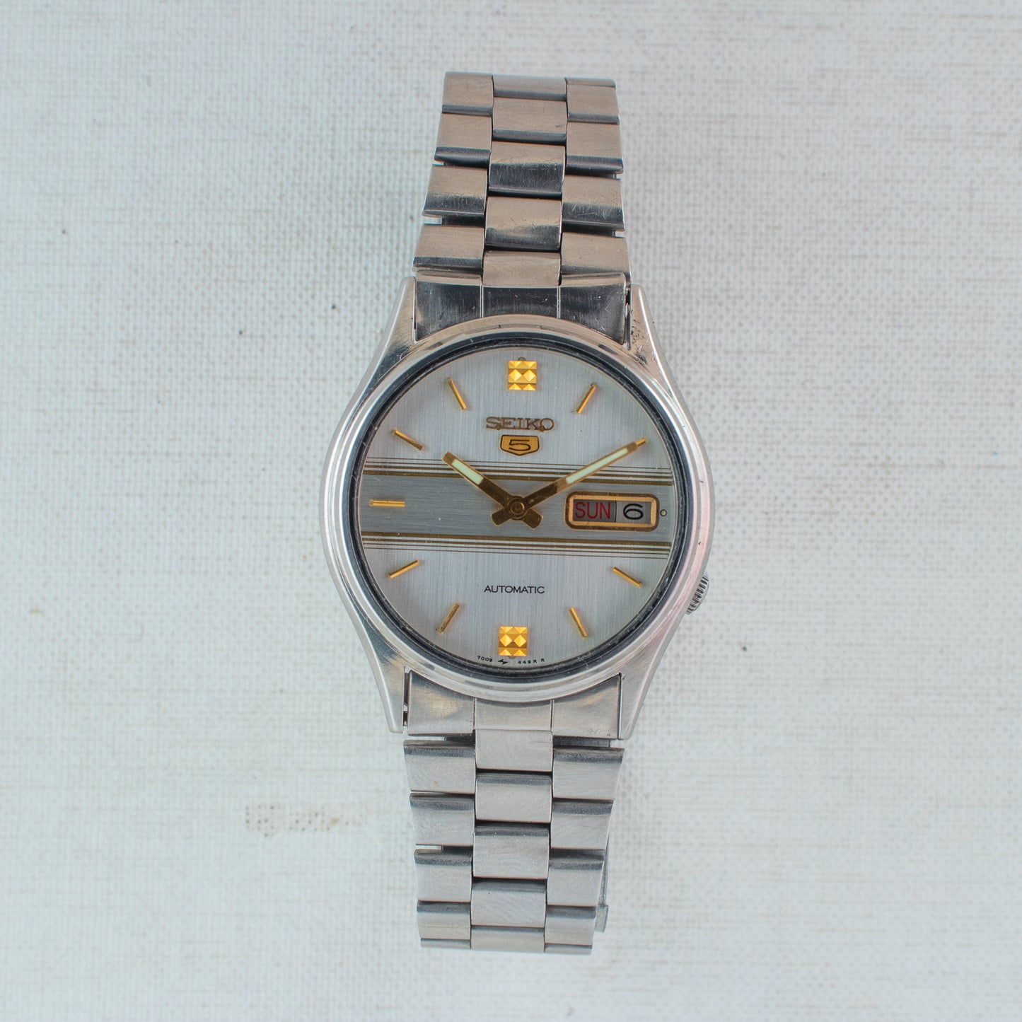 Vintage Seiko 5 Automatic Watch 7009-3100, Striking White Dial Gold Accents
