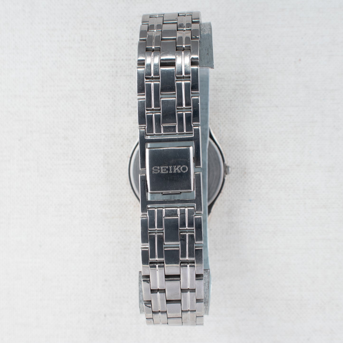 Vintage Seiko Quartz Dress Watch V701-2K30 Silver Striped Dial Stainless Steel