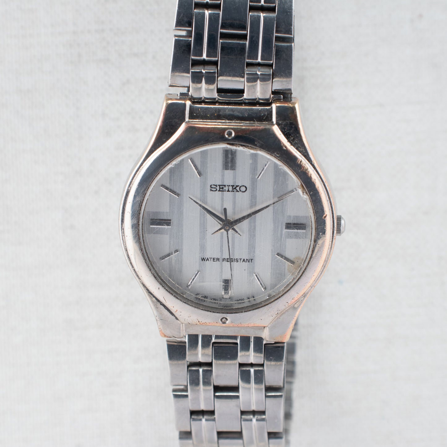 Vintage Seiko Quartz Dress Watch V701-2K30 Silver Striped Dial Stainless Steel