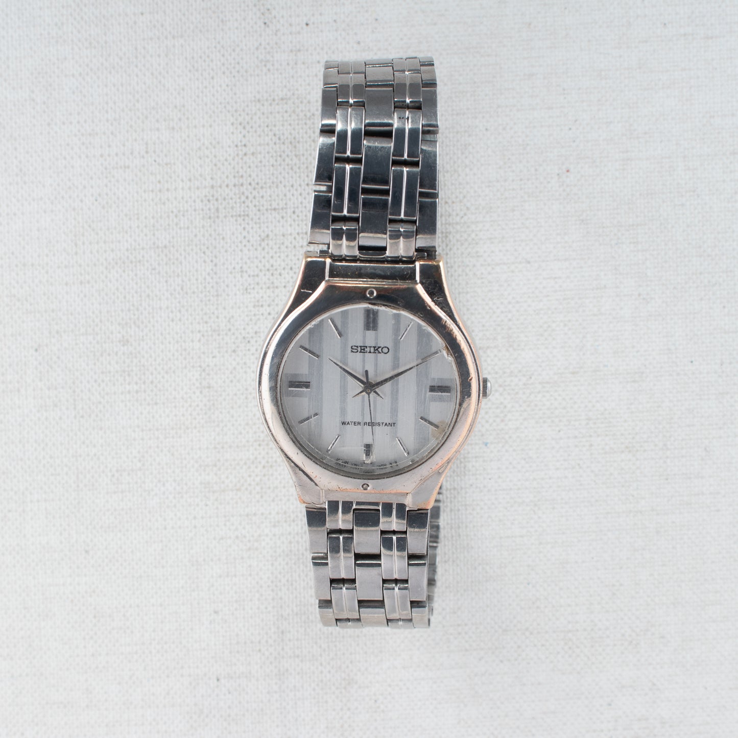 Vintage Seiko Quartz Dress Watch V701-2K30 Silver Striped Dial Stainless Steel
